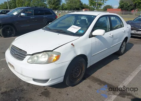 2004 Toyota Corolla Le from USA, damaged, VIN 2T1BR32E74C279709